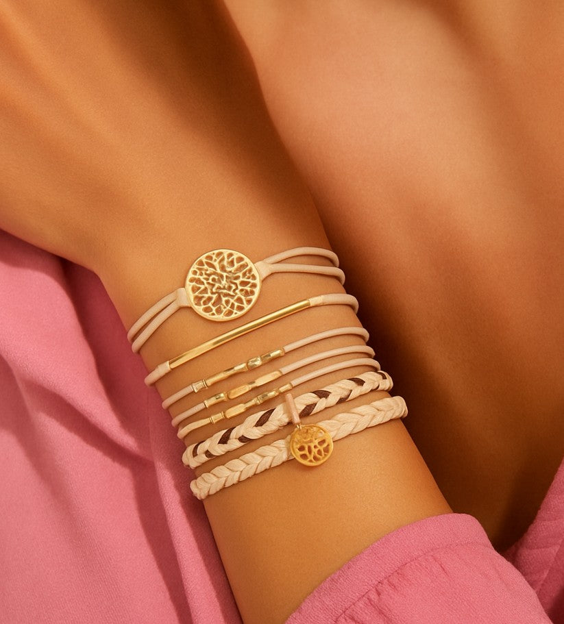 Rose gold hair tie bracelet with black elastic band